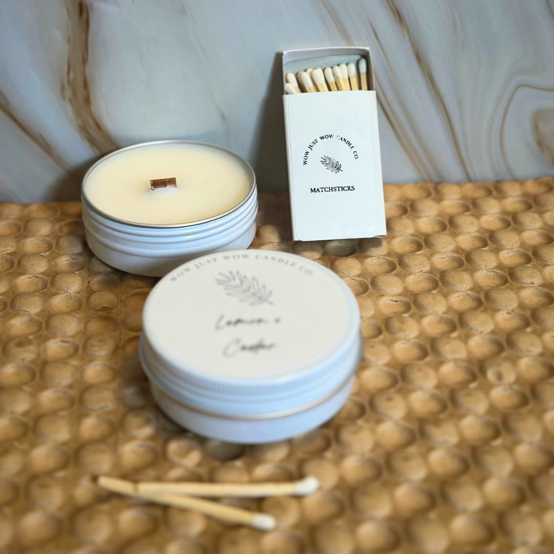 Soy candle in white jar with wick; matching lid and Matchstick-style box with matches