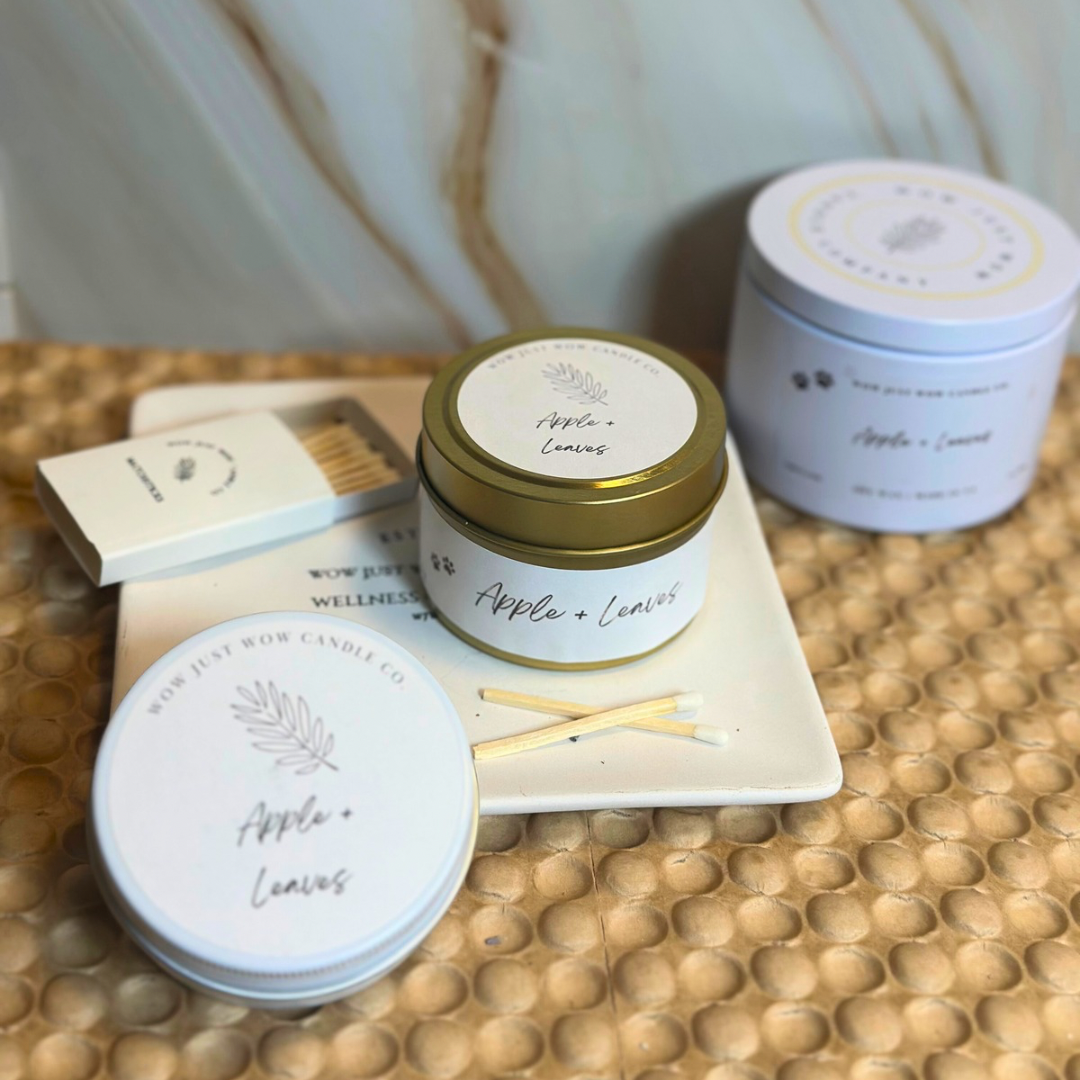 Soy candle tin set with gold and light-blue lids and included wooden matchsticks