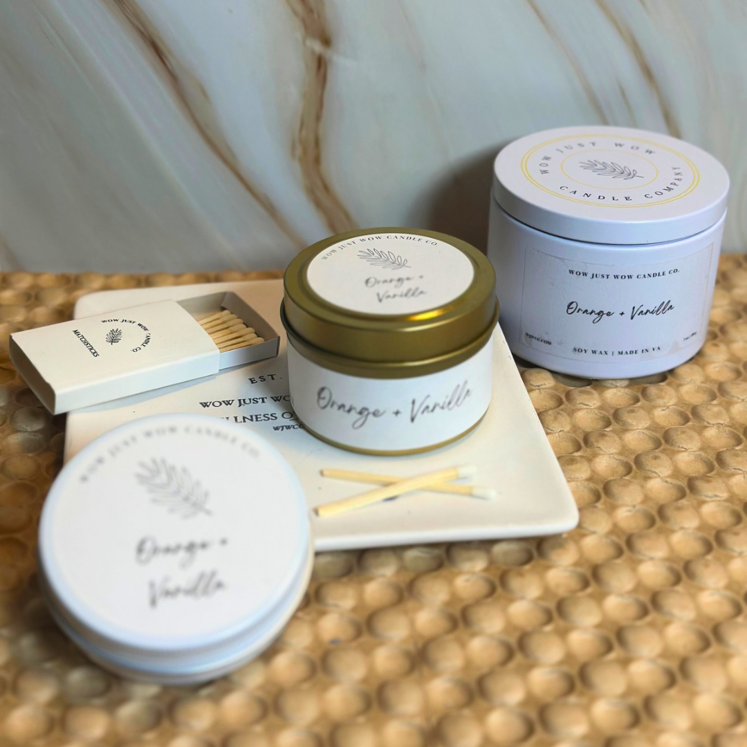 Orange vanilla candle set: gold-lidded tin, white matchbox, and lid close-ups with matches